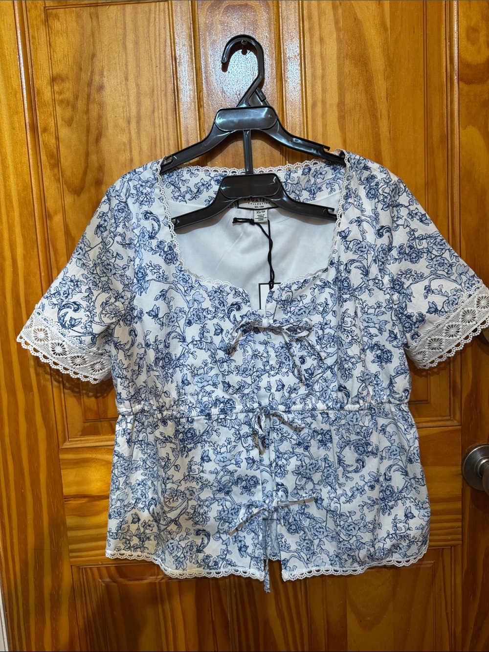 Blue Floral Tie-Front Peplum Blouse with Lace Trim